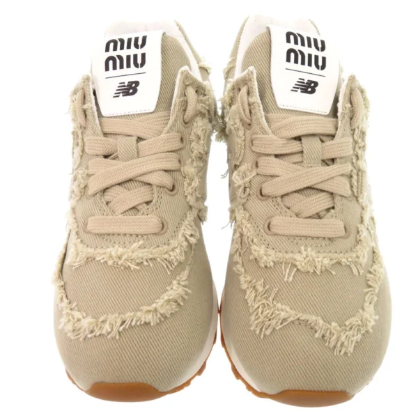 Miu Miu x New Balance 574 denim sneakers ll
